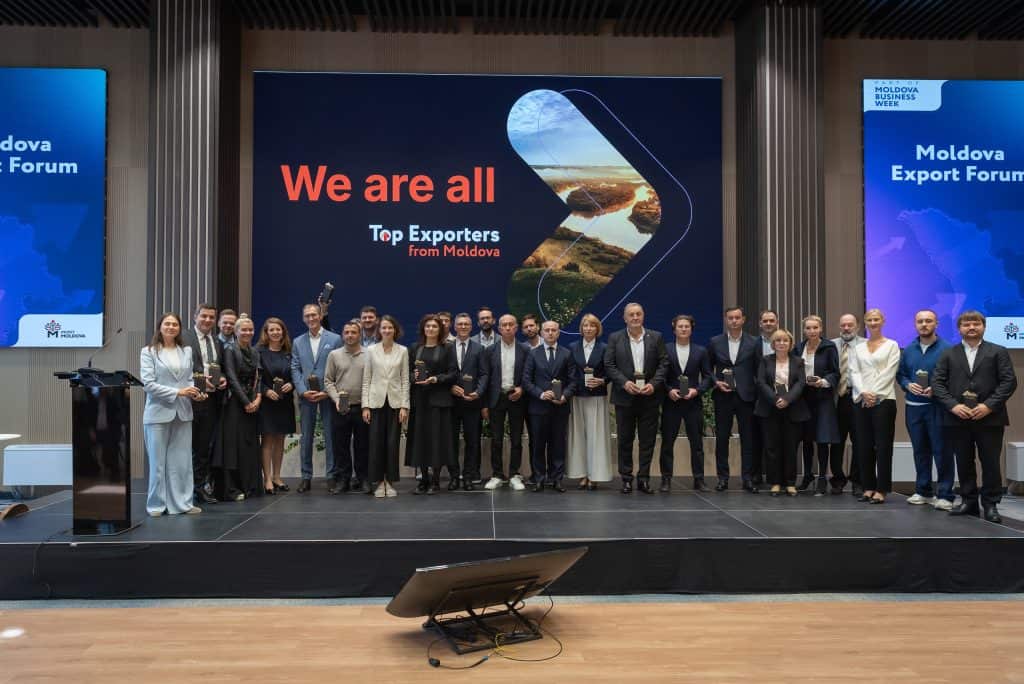 Andrian Visnevschi accepting the Top Exporters from Moldova award for ITcare at Moldova Business Week 2026