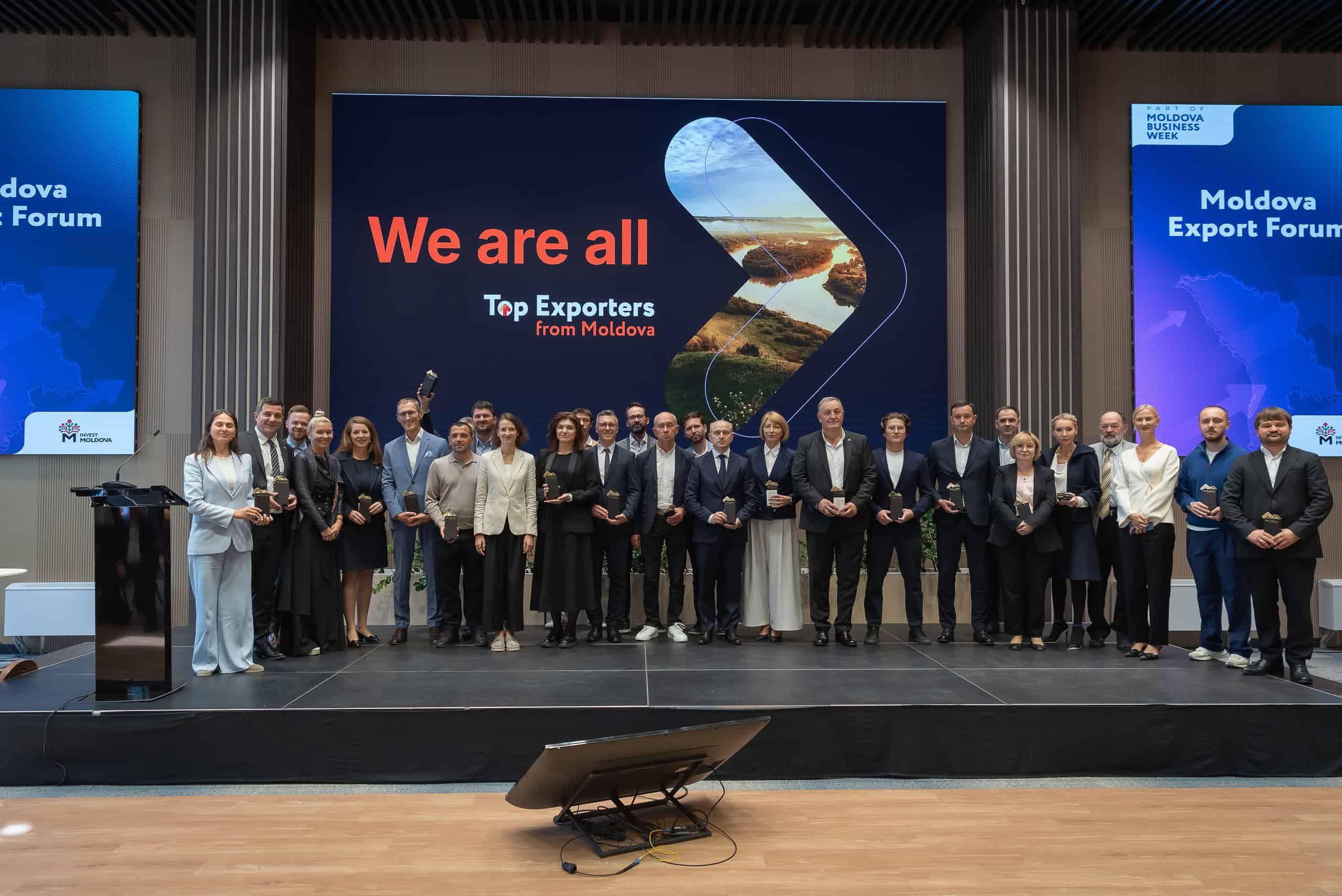 Andrian Visnevschi accepting the Top Exporters from Moldova award for ITcare at Moldova Business Week 2026