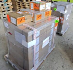 Newly delivered Juniper MX304 routers, boxed and palletized in the ITcare warehouse